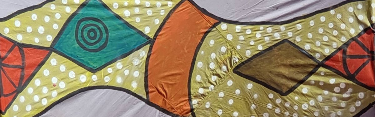The Rainbow Serpent banner created as part of the production